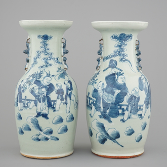 A pair of blue and white Chinese vases on celadon ground with playing boys 19th C.