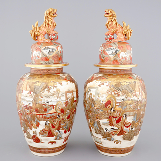 A very tall pair of Japanese Satsuma vases and covers, 19th C.