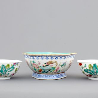 A Chinese famille rose bowl and two famille rose bowls with flowers