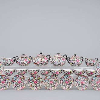 A Chinese black ground and famille rose tea service, ca. 1900, marked Qianlong