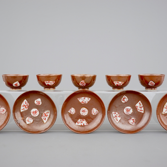 A set of five Chinese batavia brown, gred and gilt cups and saucers, 18th C.