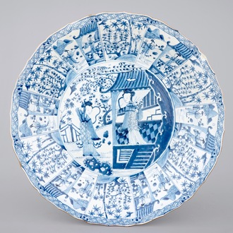 A very large blue and white Chinese dish with ladies in a garden, Kangxi, ca. 1700