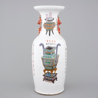 A tall Chinese vase with incense burners and calligraphy, 19th C.