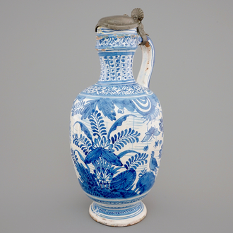 An early Dutch Delft blue and white pewter-mounted jug, 1630-1650