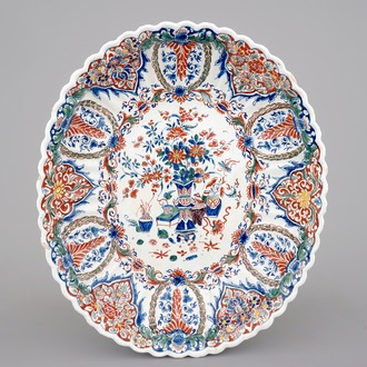 A fluted oval Dutch Delft dish in cashmere palette, ca. 1700
