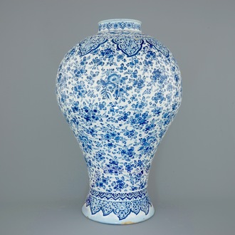 An unusually tall Dutch Delft blue and white vase with millefiori decoration, late 17th C.