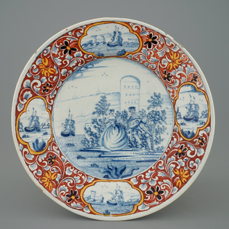 A Dutch Delft mixed technique plate with a pastoral scene, 18th C.