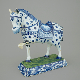 A blue and white Dutch Delft figure of a horse, 18th C.