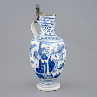 A blue and white chinoiserie jug with pewter lid, Haarlem, first half 17th C.