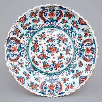 A Dutch Delft notched plate in cashmere palette, 18th C.