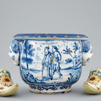 A pair of Dutch Delft polychrome pottery shoes and a blue and white bowl, 18th C.