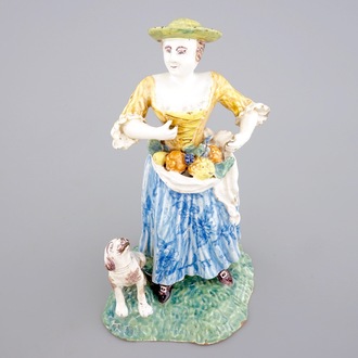 Une grande groupe en faïence polychrome de Nevers, d'une dame au chien, 18ème