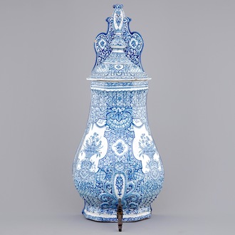 A massive blue and white Dutch Delft cistern with pewter spout, 18th C.