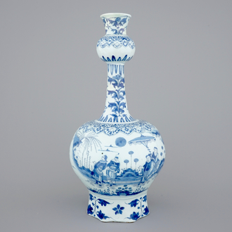 A tall blue and white Dutch Delft garlic neck vase with chinoiserie decoration, 17th C.