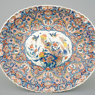 A fluted oval Dutch Delft dish in cashmere palette, ca. 1700