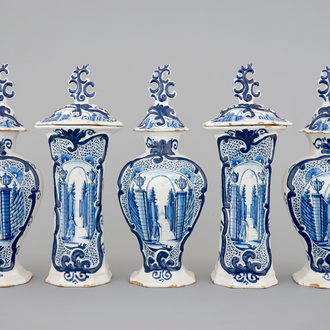 A 5-piece blue and white Dutch Delft garniture with architectural design, 18th C.