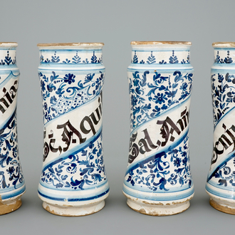 A set of four tall Spanish blue and white albarelli, 18th C.