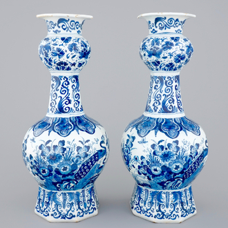 A pair of blue and white Dutch Delft vases with peacocks, ca. 1700