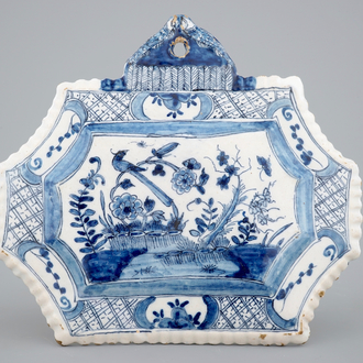 A blue and white Dutch Delft floral chinoiserie plaque, 18th C.