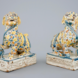 A pair of polychrome Spanish Talavera pottery lions, 18th C.