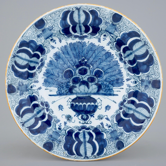 A fine blue and white Dutch Delft peacock tail's plate, 18th C.