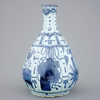 A Dutch Delft blue and white chinoiserie bottle vase, late 17th C.