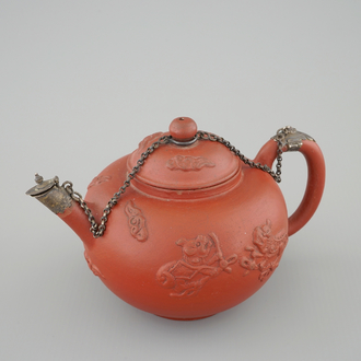 A Dutch Delft Ary de Milde red earthenware teapot and cover, late 17th C.