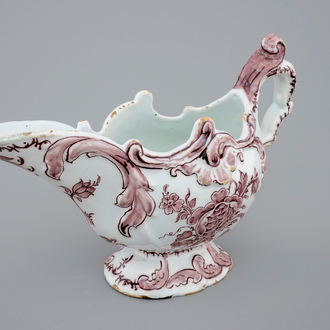 A manganese Dutch Delftware sauceboat, 18th C.