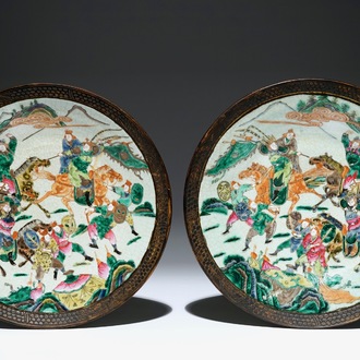 A pair of large Chinese Nanking famille rose warrior chargers, 19th C.