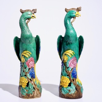 A pair of Chinese famille rose models of phoenixes, early 20th C.
