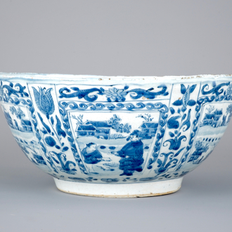 Een Chinese blauw-witte kraak porseleinen kom met vakverdeling van landschappen, Ming, Wanli