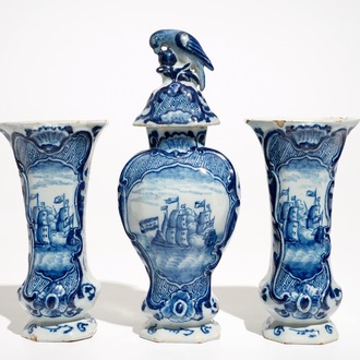 Een driedelig blauwwit Delfts kaststel met maritiem decor, 18e eeuw