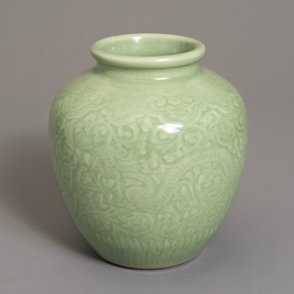 A Chinese celadon-glazed vase with underglaze dragon design, 19/20th C.