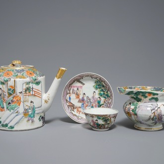 A Chinese famille verte teapot and milk jug, 19th C., and a famille rose cup and saucer, Qianlong