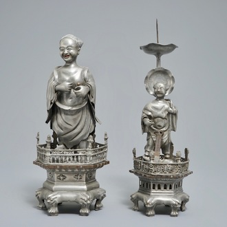 A Chinese pewter candlestick and a figure of a boy, 19/20th C.