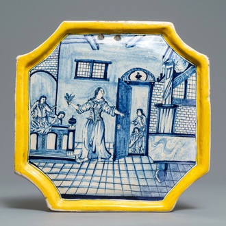 A Dutch Delft blue and white yellow border 'tobacco shop' plaque, 18th C.