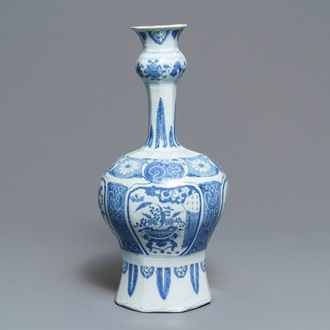 A tall Dutch Delft blue and white chinoiserie vase, late 17th C.