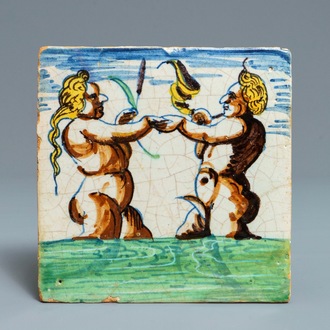 A polychrome Dutch Delft 'Triton and mermaid' tile, Rotterdam, 1st quarter 17th C.