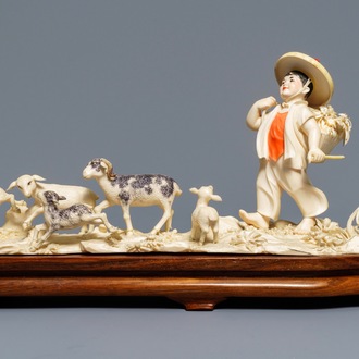 Een polychrome Chinese ivoren groep met een herdertje, ca. 1940