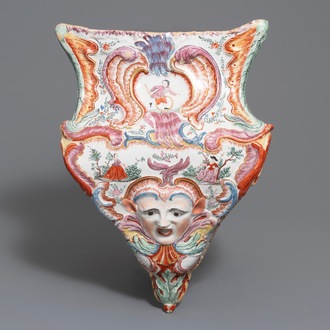 A large petit feu and gilded Dutch Delft wall cistern, 18th C.