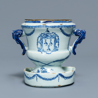 A Dutch Delft blue and white armorial 'campana' vase on stand, 18th C.