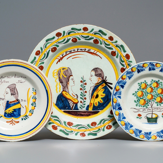 Twee polychrome Delftse 'Oranje' borden en een schotel, 18e eeuw