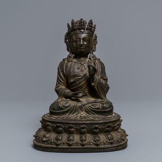Een Chinese bronzen figuur van Boeddha, Ming