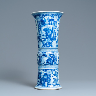 Een Chinese blauw-witte 'gu' vaas met landschaps- en florale medaillons, Kangxi