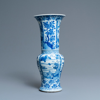 Een Chinese blauw-witte 'yenyen' vaas met landschappen en florale panelen, Kangxi