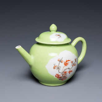 A Chinese iron red and grisaille lime green-ground teapot and cover, Qianlong