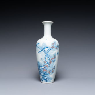A Chinese blue, white and copper-red 'magpie and prunus' vase, Kangxi mark, 19/20th C.