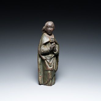Een gepolychromeerde houten sculptuur van een engel, Zuidelijke Nederlanden, mogelijk Doornik, 14/15e eeuw