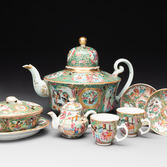 Two Chinese Canton famille rose teapots, a small covered tureen with stand, two cups and two saucers, 19th C.