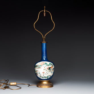 A Chinese famille verte powder blue-ground vase mounted as lamp, 19th C.